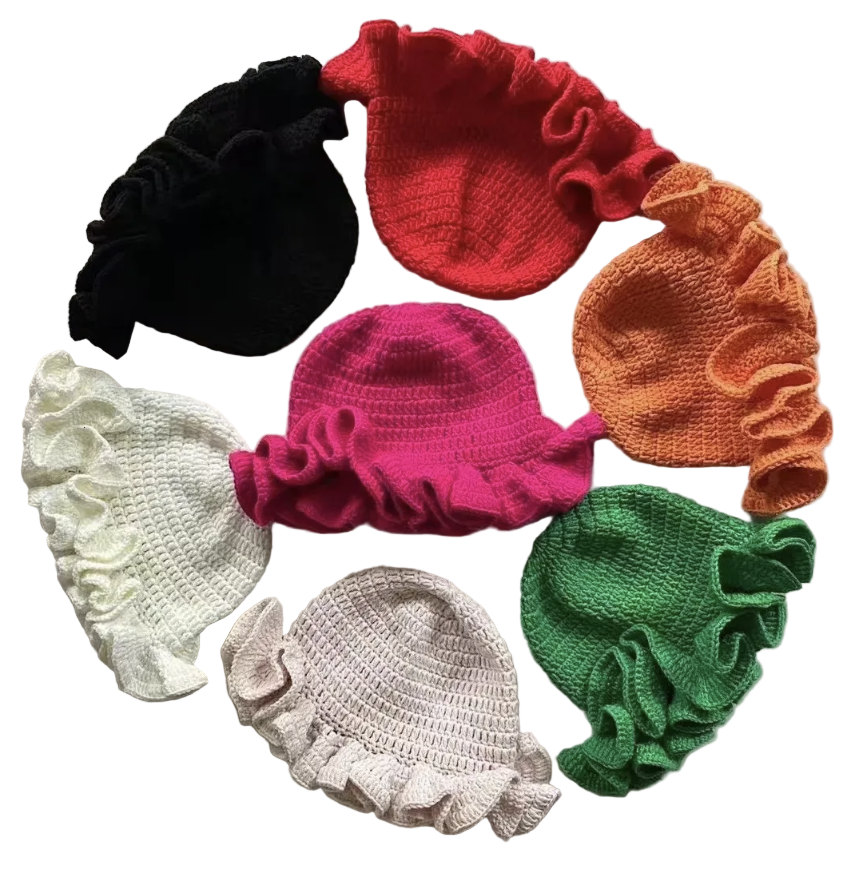 Set of colorful knitted headbands on a light background